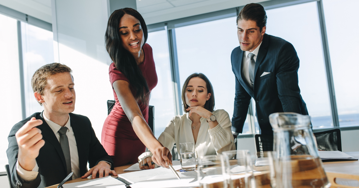 Professionals collaborating around a conference table